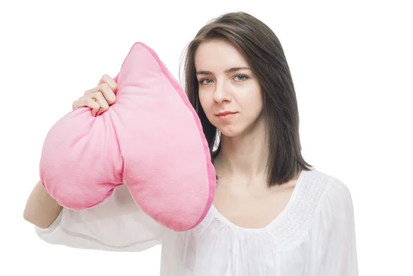 Girl with valentine pink pillow heart — Stock Photo, Image