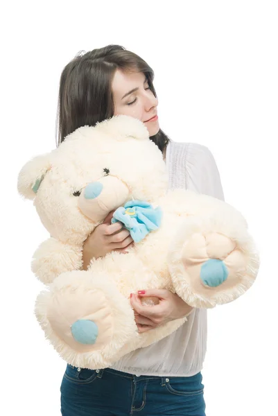 Young girl holding big teddy bear — Stock Photo, Image