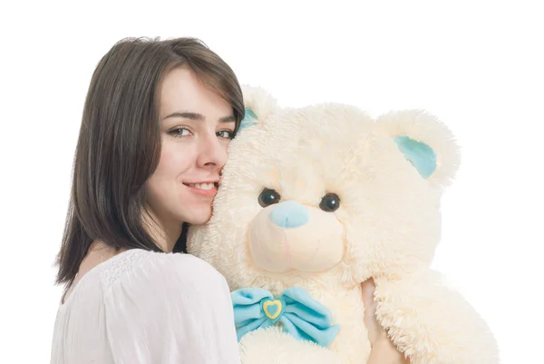 Jeune fille tenant un gros ours en peluche — Photo