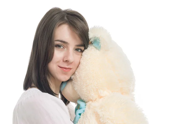 Menina jovem segurando grande ursinho de pelúcia — Fotografia de Stock