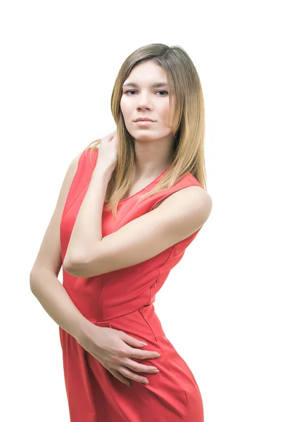 Young girl in a red dress on a white background — Stock Photo, Image