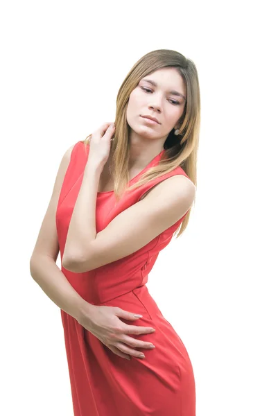 Menina em um vestido vermelho em um fundo branco — Fotografia de Stock