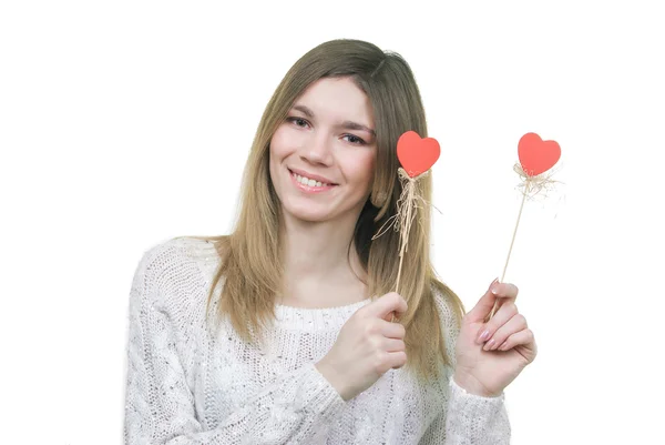 Bella mujer sosteniendo corazones sonriendo — Foto de Stock