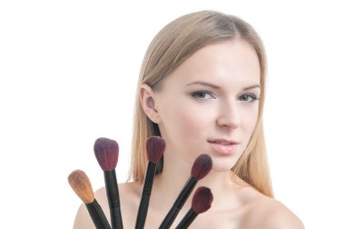 Kız beş makyaj fırçaları ile güzellik fotoğrafı.