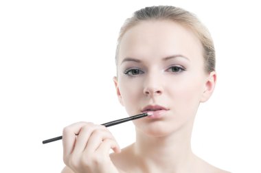 beyaz izole ruj fırçası ile kız