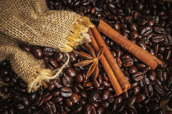 Spices on coffe beans — Stock Photo, Image