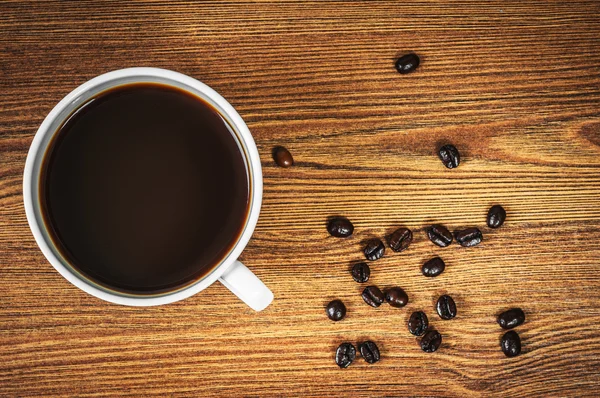 White cup of coffee on the table — Stock Photo, Image