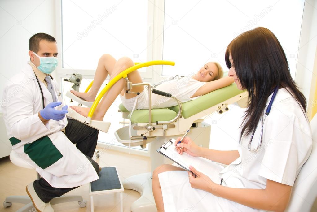 Gynecologist examining a patient