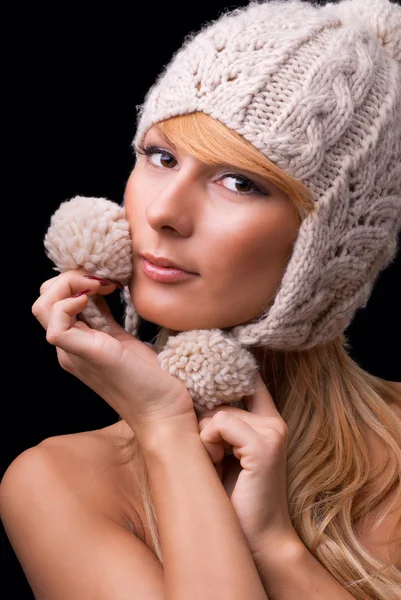 Beautiful girl wearing knitted hat — Stock Photo, Image