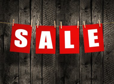 SALE on wood background clipart