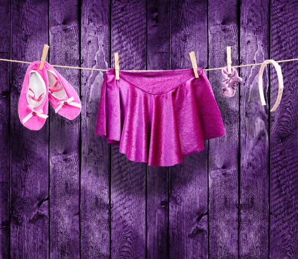 Ballet clothes, accessories on a clothesline — Stock Photo, Image