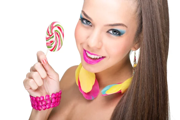 Colorful fashion model with lollipop — Stock Photo, Image