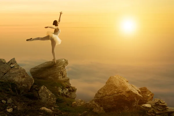 Mystic pictures, ballet dancer stands on the cliff edge — Stock Photo, Image