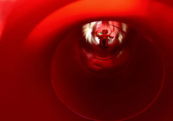 The inside of a large red chute — Stock Photo, Image