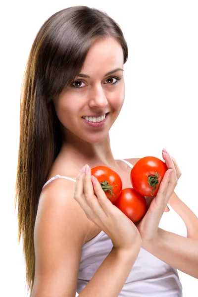 Mujer sosteniendo un tomate —  Fotos de Stock