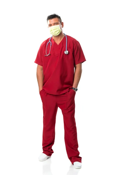 Ağız maskesi, yakışıklı genç bir doktor stetoskop — Stok fotoğraf