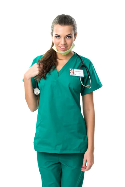 Pretty surgeon in green dress — Stock Photo, Image