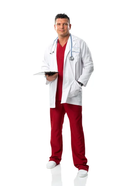 年轻英俊的医生在医疗礼服 免版税图库图片