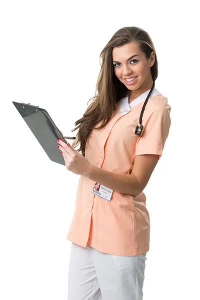 Nurse writing document — Stock Photo, Image