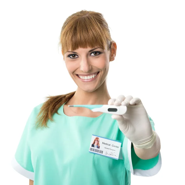 Krankenschwester zeigt Thermometer — Stockfoto