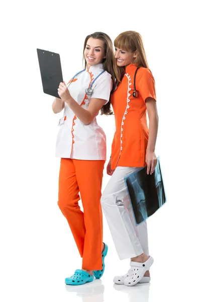 Nurses watching X Ray image — Stock Photo, Image