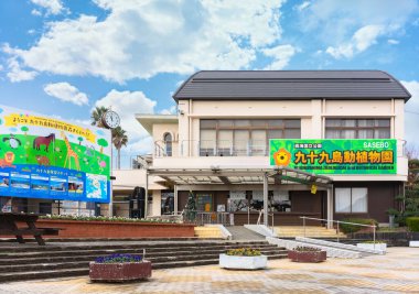 kyushu, japan - december 09 2021: Kujukushima zoological and botanical garden also called Ishidake Zoo & Botanical Garden with an illustrated panel with animals in the saikai national park of Sasebo.