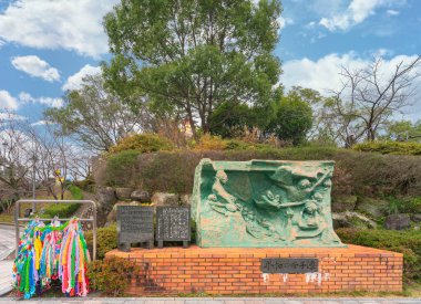 nagasaki, kyushu - december 11 2021: Atomic bomb memorial monument called Mother and Child statue of Peace created in 1987 at the Nagasaki National Peace Memorial Hall for the Atomic Bomb Victims.
