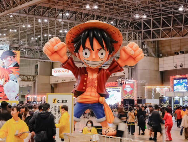 chiba, japan - december 22 2018: Huge inflatable structure depicting the character Monkey D. Luffy wearing his straw hat from the anime and manga serie One Piece overlooking the convention Jump Festa.