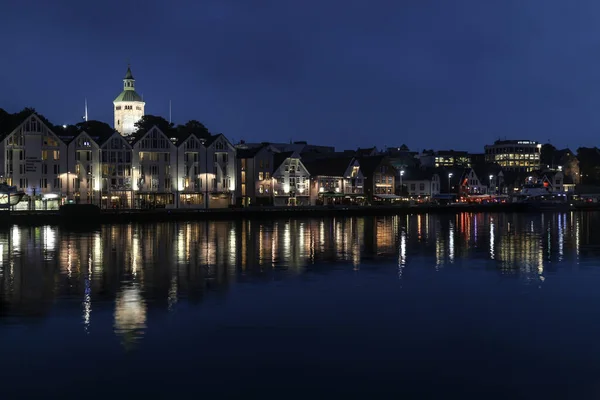 Harbor night image, port of the Norwey. Fishing village.
