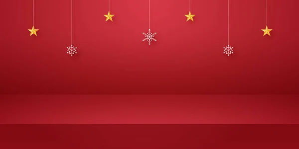 Kırmızı boş stüdyo odası. Ürün arka planında kar tanesi ve yıldız asılı. Noel günü için şablon modeli.