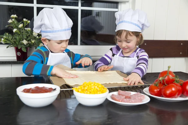 Children preparing pizza — Stock Photo, Image