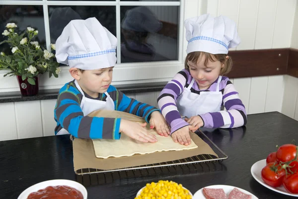 Children preparing pizza — Stock Photo, Image