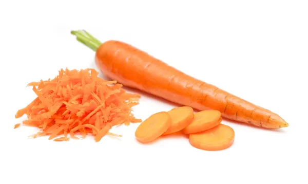 Carrot with sliced and grated pieces — Stock Photo, Image