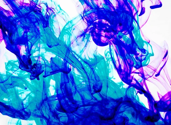 Blue and purple  inks in water — Stock Photo, Image