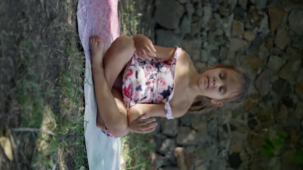 Little Beautiful Girl Meditates Yoga Mat Summer Garden Sits Lotus — Stock Video