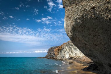 Idyllic coves of the Barronal with blue and transparent waters in the Natural Park of Cabo de Gata and Njar in Almera, Andalusia, Spain.