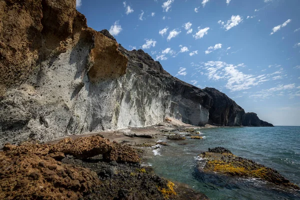Idyllic coves of the Barronal with blue and transparent waters in the Natural Park of Cabo de Gata and Njar in Almera, Andalusia, Spain.