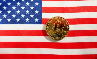 Bitcoin Amerikan bayrağının üzerinde yatıyordu. Kripto para birimi hükümet düzenlemeleri. 