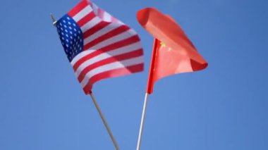 USA and Chinese flags waving 4k video. International conflicts. America and Asia economy 