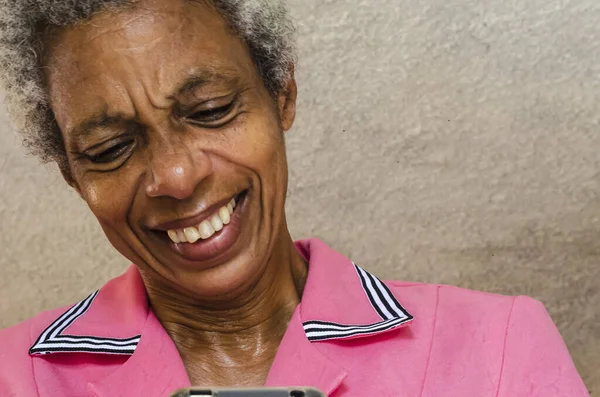Senior Jamaican Woman Grey Black Hair Brown Skin Has Wide Royalty Free Stock Images