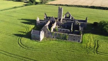 This is a 4k aerial video of a low fly over of the ruins of Kilcrea Friary in County Cork Ireland