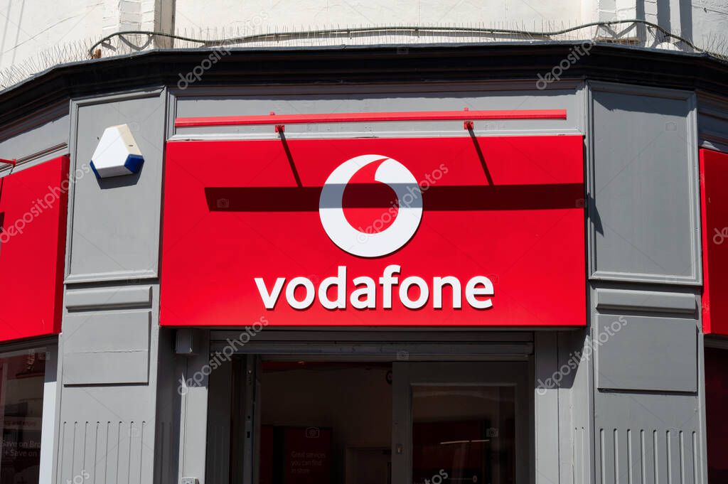 Chesterfield, UK- May 14, 2022: The sign for Vodafone store in Chesterfield England.