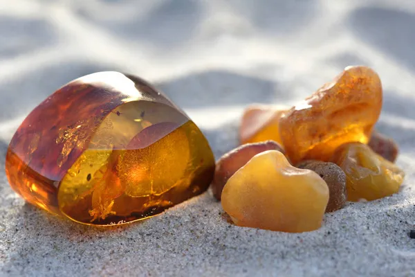 Polished Unpolished Amber Stone Stock Photo