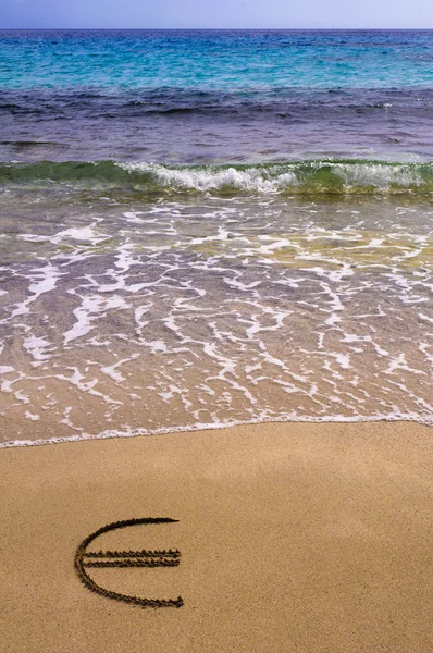 Euro sign in the sand — Stock Photo, Image