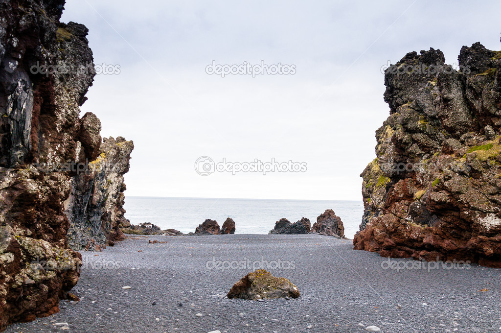 Icelandic beach with black lava rocks, Snaefellsnes peninsula, Iceland