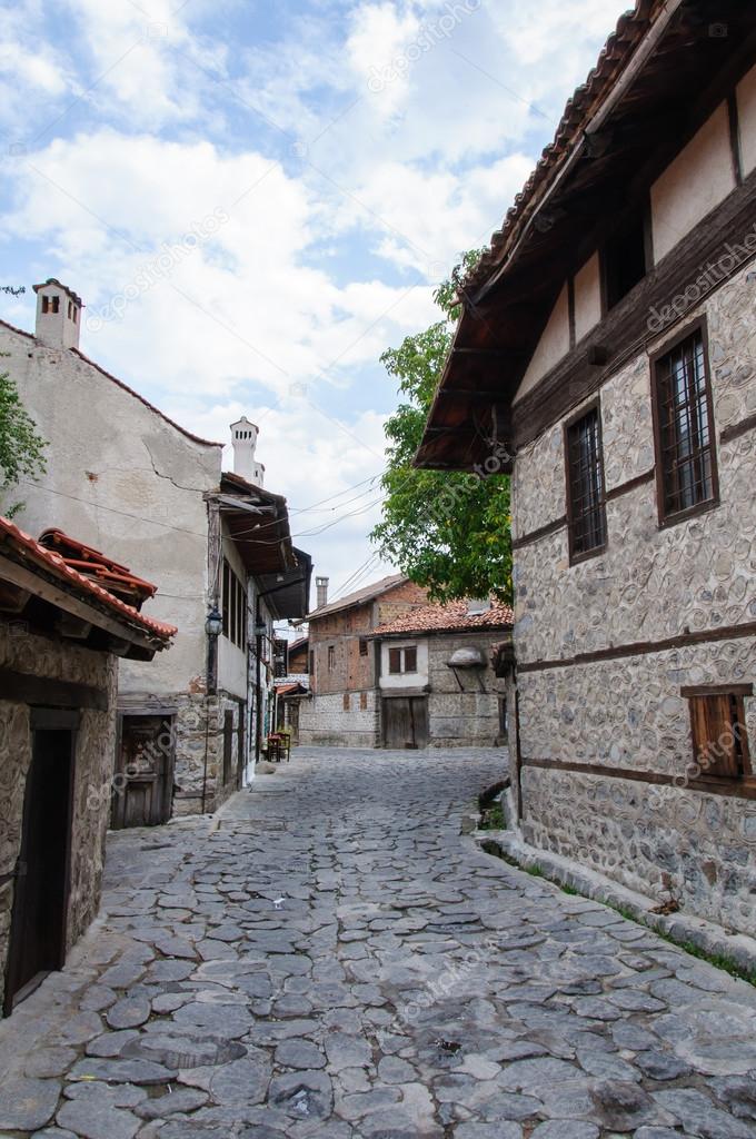 View of paved walkway with traditional bulgarian architecture from Bansko, Bulgaria