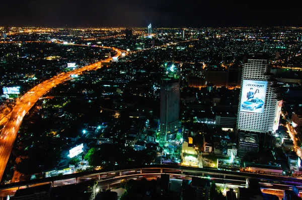 Bangkok, Thailand - May 24, 2014: Night view over Bangkok city, Thailand.Bangkok is the capital and the most populous city of Thailand with a population of over eight million. — Stock Photo, Image