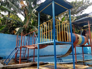 playground in the swimming pool on a sunny day