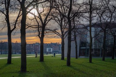 22 December, 2021, Amsterdam, Netherlands,  Sunset  image of the Museumplein and Van Gogh museum, during the winter holidays, Christmas and New Year