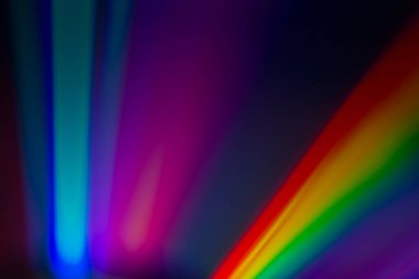 Image of the reflecting surface of shiny object illuminated with sun light. Abstract psychedelic spectrum background